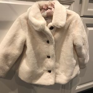 Faux fur jacket. Never worn.